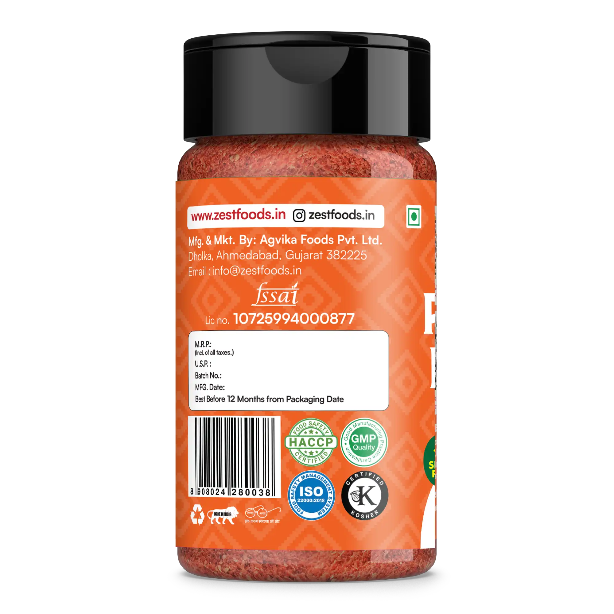 Spice jar with orange label and black lid on a white background