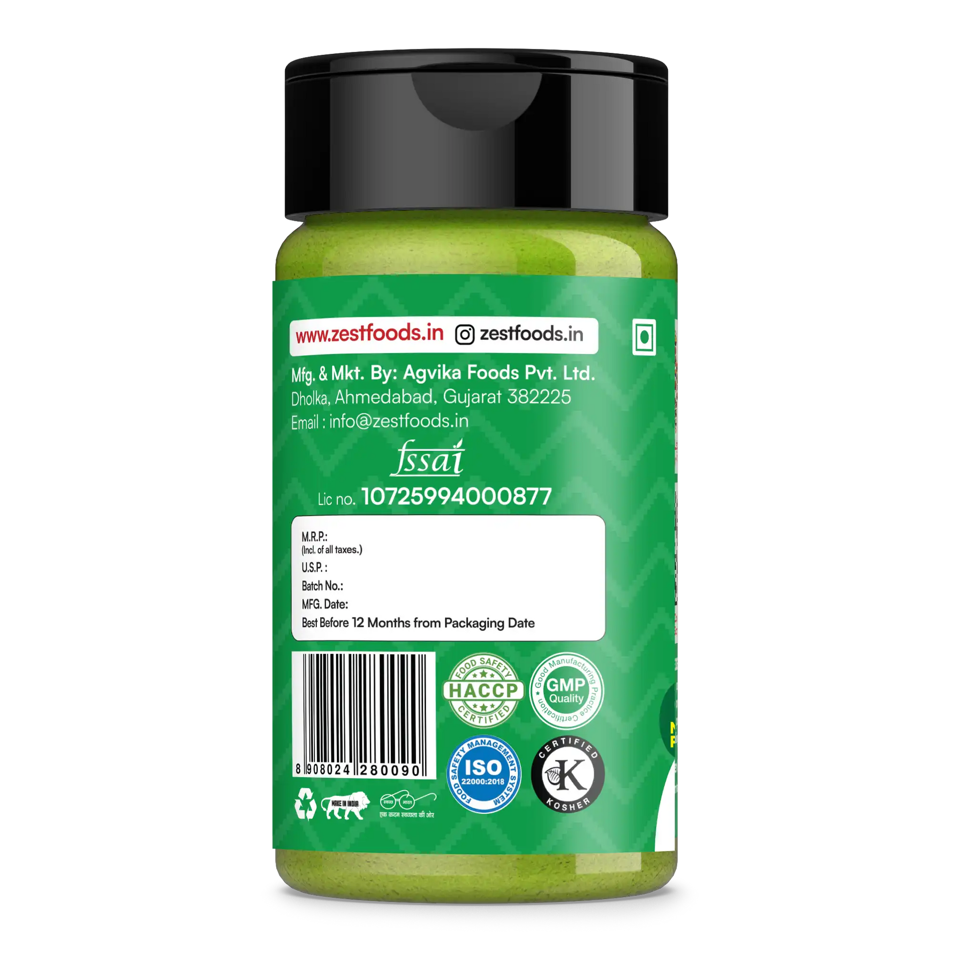 Green jar with black lid on a white background