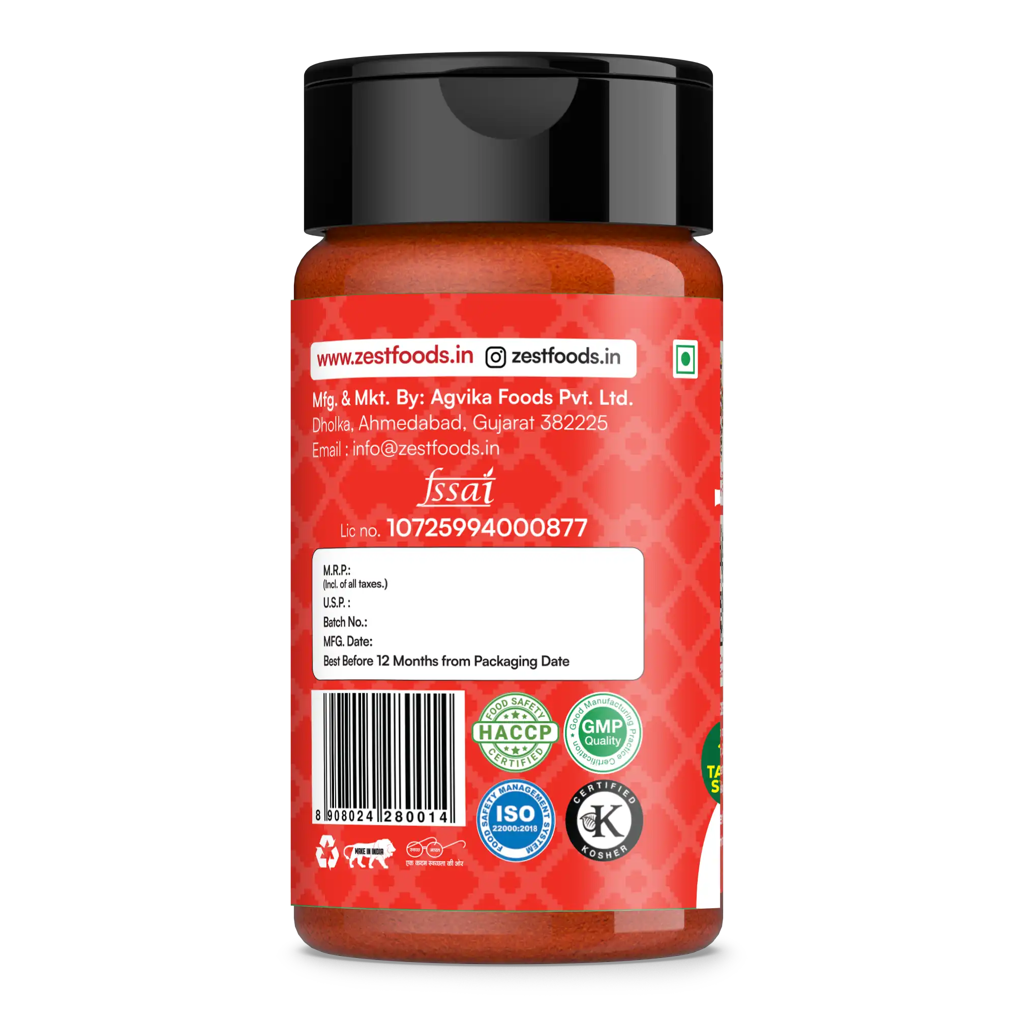 Red spice jar with black lid on a white background