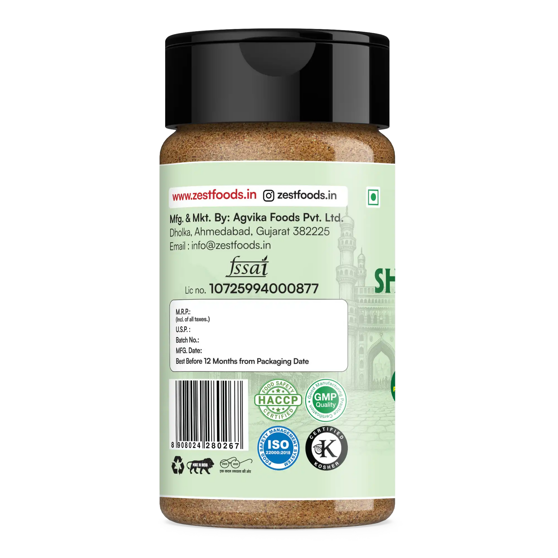 Spice jar with a green label and black lid on a white background